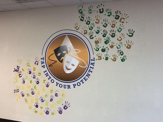 Handprint wall. Each cast gets to put their hand prints on the wall of our studio!