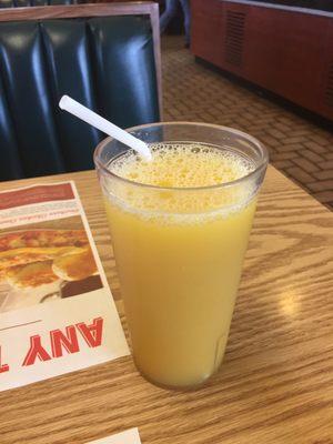 Large glass of OJ