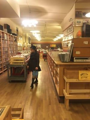 The misses strolling through the vinyl aisles. Truly shows the stores depth (which is deceiving from the exterior!)