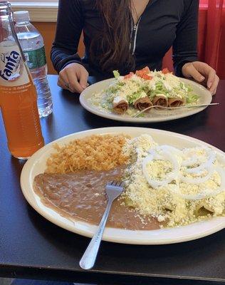 Chicken Enchiladas Verdes plate (near) and Chicken Flautas (far)