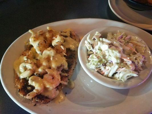 Lightly breaded tilapia covered in a garlic cream shrimp sauce.