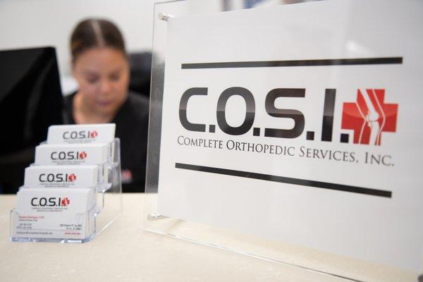 Look for our COSI sign for check in!