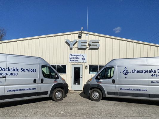 Our vans at our new office after acquiring Yacht Electronics Systems