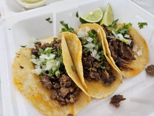 2 steak tacos, 1 Barbacoa taco, both delicious