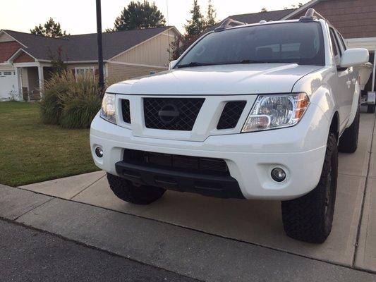 Repainted front end w/ a new color matched painted grille.