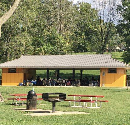 Restrooms, outdoor picnic facilities, and cooking grills in the center of Lions Park.