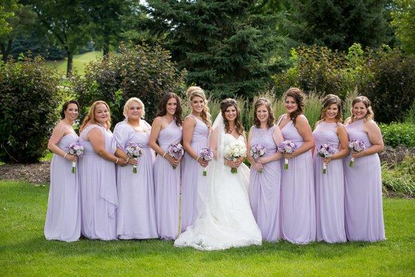 First 6 girls (including Bride) starting from the right got hair and makeup.