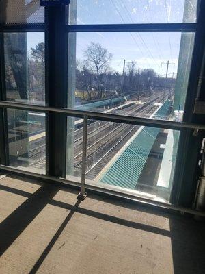 Bridge / overpass to get on the other side of the platforms overlooking the tracks