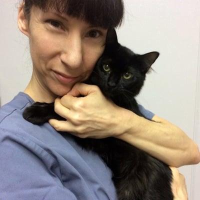 Veterinary Technician & Superstar Animal Caregiver, Kat Sullivan, getting some kitty love!