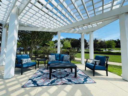 Gazebo with chairs at The Chase Apartment Homes located in Burlington, NC.