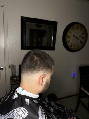 This is a med fade haircut that was in the process of beginning. I  like to see what im doing med way to catch details towards the end .