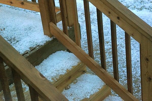 Pea sized up to Quarter sized hail on the steps of a deck....