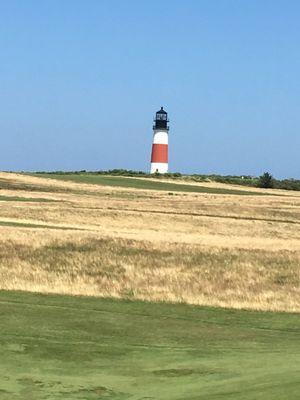 One of our stops along a golf course with lighthouse in the distance.