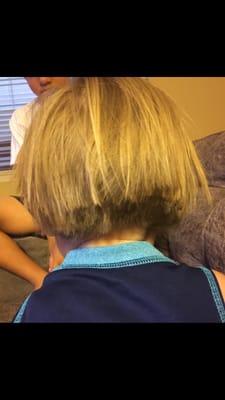 My son's hair after she butchered it into a girls hair style bob! I told her to keep it the same simple style, just trim!