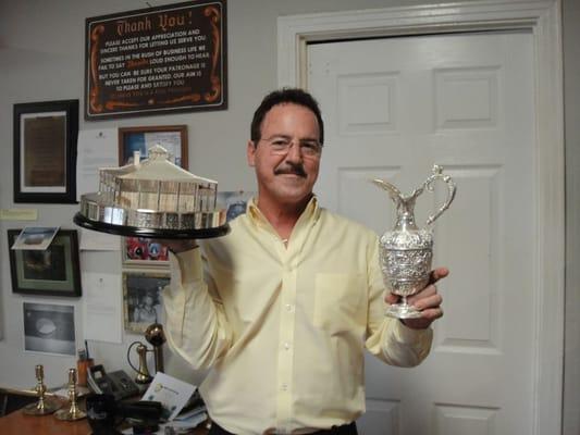 We restored Freddie Couples' trophies