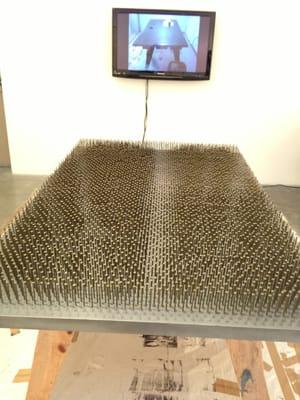 Not sure the title of this, but it is a lot of nails with a video of it being created.