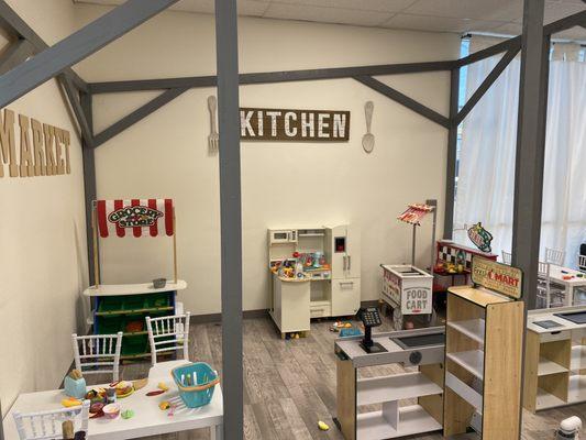 food play area has grocery store, kitchen, food cart, and diner