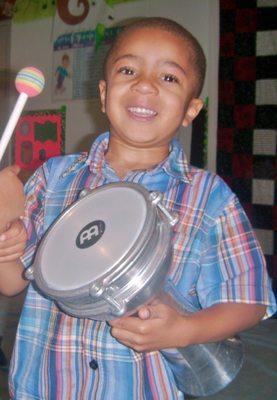 Drumming a steady beat prepares a child's brain for math & reading. Plus, it's so much FUN!