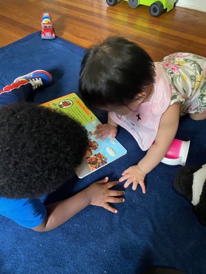 She loves reading books at home now too!