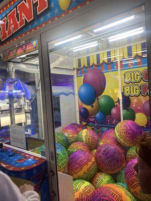 Giant claw machine.