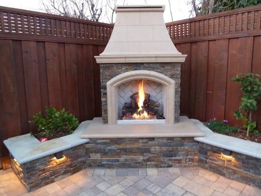 Lit Outdoor Fireplace & Sitting Wall with low-voltage lighting