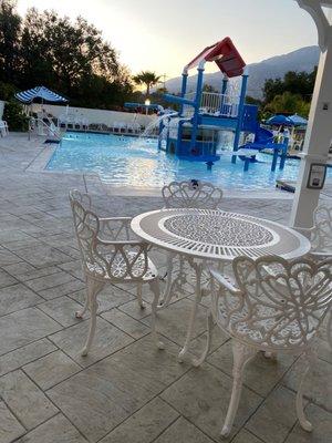 Picture of the gazebo area that overlooks the child's play pool, quiet and peaceful at this time of day (7:50)