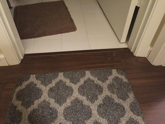 In an old apartment, Richard Smith General Contractor did a great job installing new laminate floors.