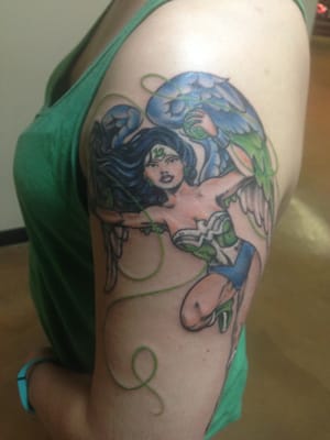 Noelle's Knitting Seahawk Wonder Woman tattoo by Mikey Vella