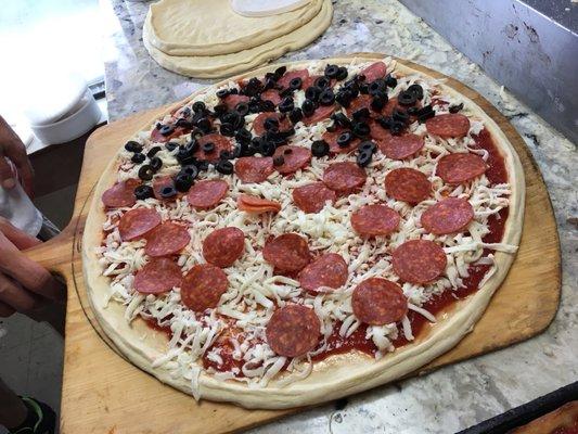 Pizza.... pepperoni and black olives