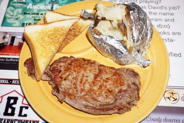 Steak and baked potatoes