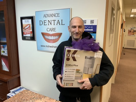 Winner of our Raffle, happy patient, happy dental team!