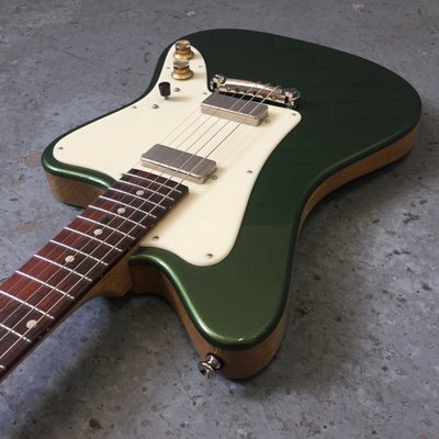 Healy Healer with Firebird pickups, acrylic pickguard and wraparound bridge.