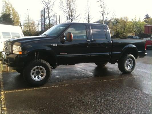 2004 F-250 Crewcab with an SCT programmer- ran a 14.37 second quartermile @ 93 mph at the Woodburn Truck Drags