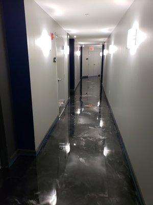 Hallway epoxy pour with metallic infusion