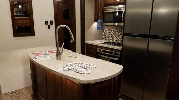 Super sweet kitchen.  Look at the size of that fridge!