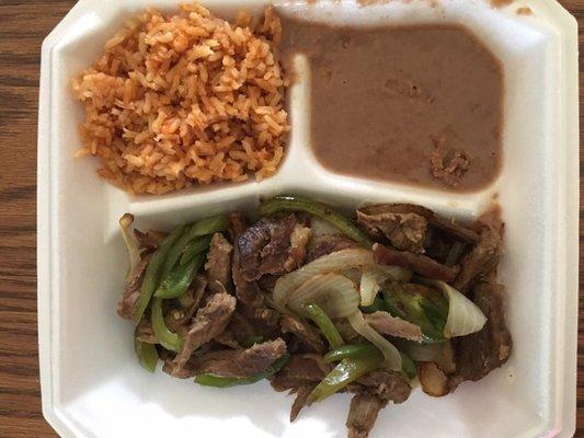 Beef fajitas plate with tortilla