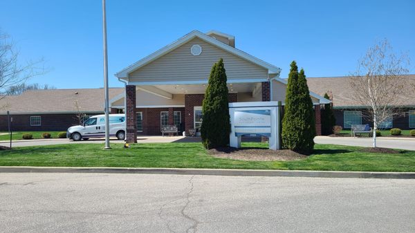 Front entrance with parking on both sides of entrance.