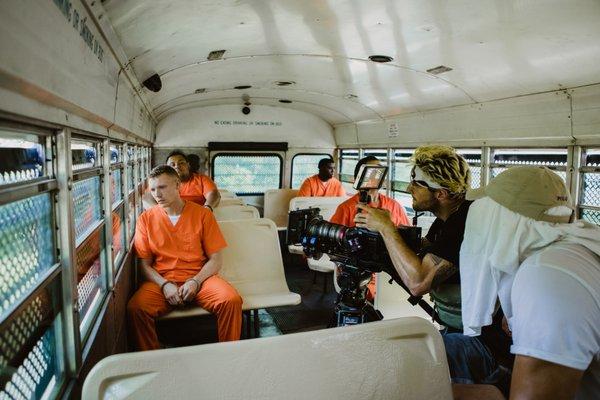 Capturing our actors being "transported" on a prison bus.