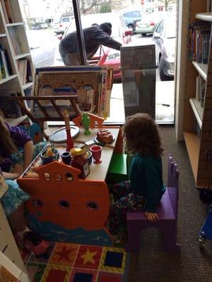 Kids stay busy at the Shabbat table while parents shop