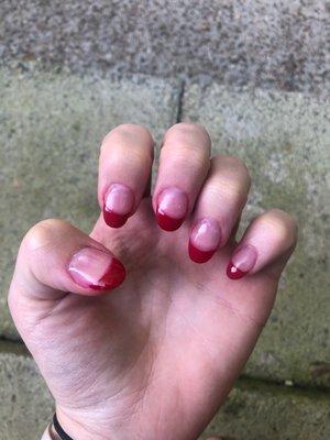 uneven nails, nothing like the photo I showed them, pink tint from lack of cleaning up the polish that I can't wash away.