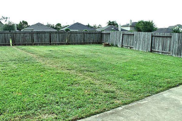 Backyard...clean cut grass, clean edge, clean patio...I don't know what else people are expecting? Lol what more do ya want?