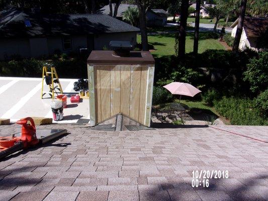 NEW PINE SIDING ON CHIMNEY - NEW CORNER TRIM BOARDS - CAULKING