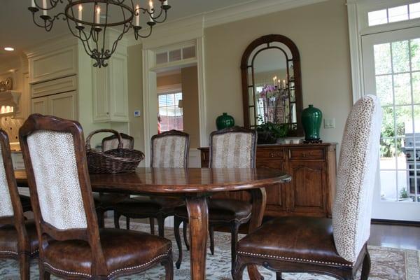 We re- upholstered the dining chairs in leather and chenille with decorative nail heads.