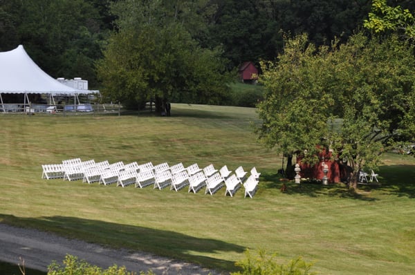 Have your wedding ceremony beside a beautiful pond with a huge granite backdrop