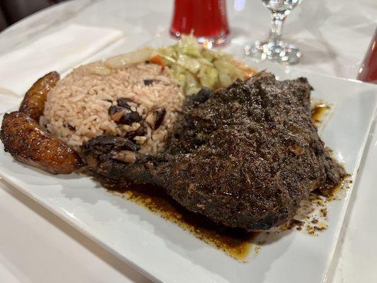 Jerk chicken, rice and peas, cabbage mixture and plantain