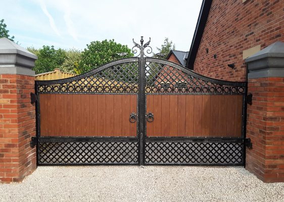 Wrought iron and wood driveway gates