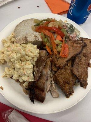 Round 1 at the fundraiser buffet: mac salad, taro, stir fry veggies, palusami, ribs, brisket, chicken, pork