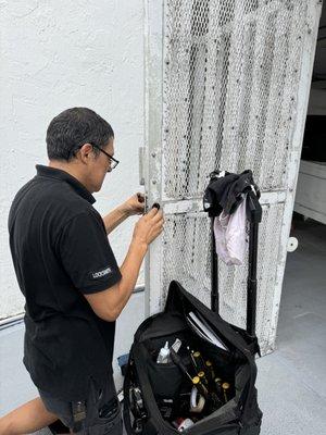 Leo working on an after hour emergency. New gate lock for a condominium near Sunny Isles Beach.