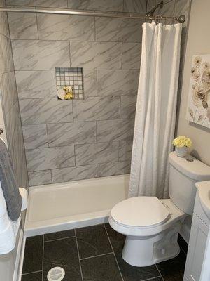 Converted laundry room into full bathroom