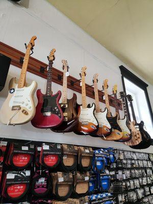 Vintage and modern strat wall.